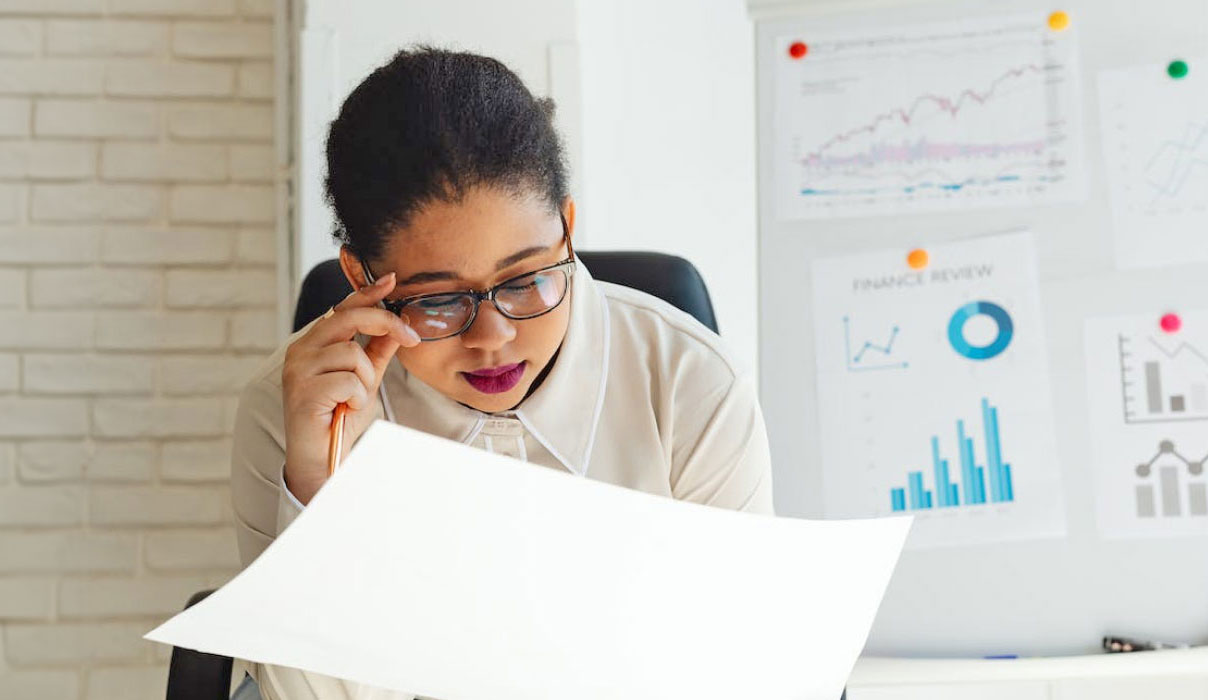 WOman Looking at Paper Woman Looking at Paper